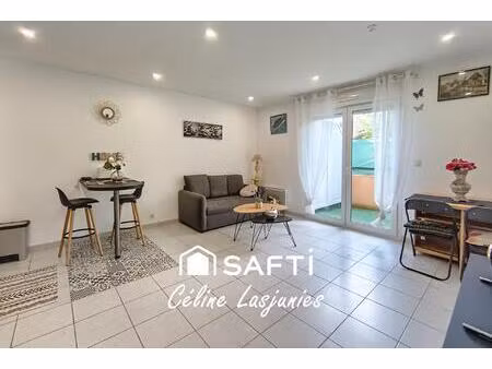 appartement t2 rénové avec balcon et parking – résidence calme et sécurisée