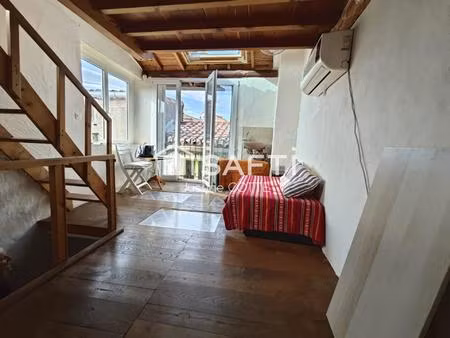 t5 vertical atypique avec mezzanine et balcon.