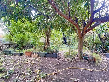 grande maison familiale avec jardin arboré