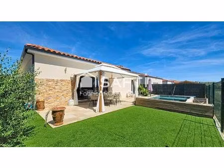 villa de plain-pied de 119 m² avec quatre chambres piscine et garage