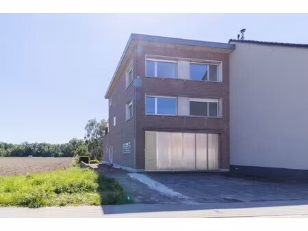 kortenberg- zeer ruime driegevel-woning op perceel van 11a