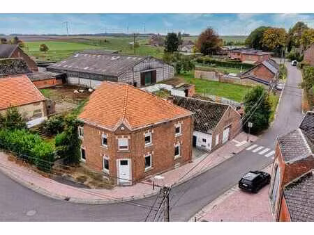 vaste maison 4 chambres  + garage + terrain à bâtir
