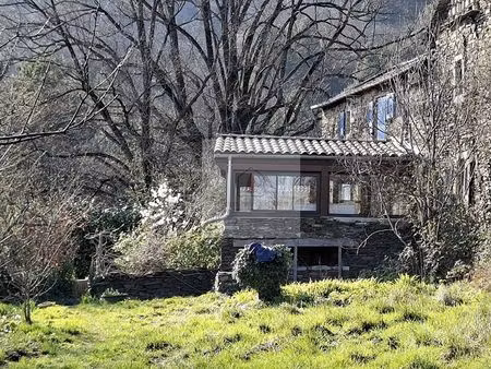maison à vendre à sainte-cécile-d'andorge - havre de paix en pleine nature