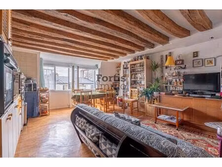 paris 2 - duplex de 3 pieces  dernier etage avec vue degagee