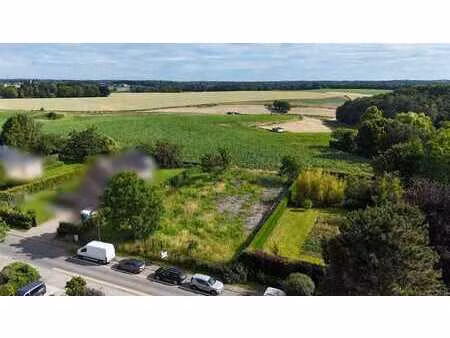 terrain à bâtir de 14 ares avec vue dégagée
