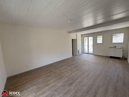 maison rénovée avec garage et terrain