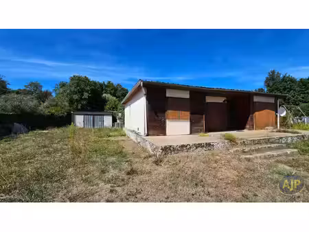 terrain 1268 m² avec maison et garage à izon