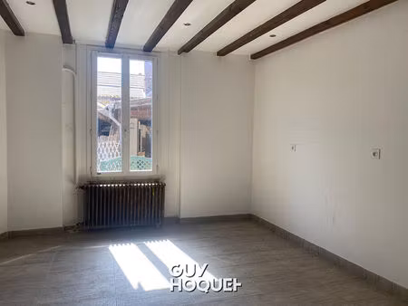 immeuble de rapport avec commerces et logements ? fort potentiel d'investissement