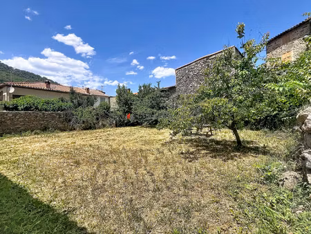 maison 2 faces de 50m² avec cave et jardin