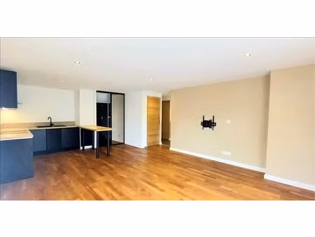 appartement - rdc - 52 m2 - 2 pièces - non meublé