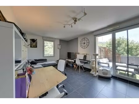 appartement t3 - 62m² - garage privatif - environnement calme e