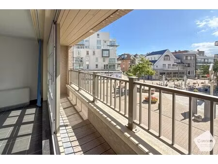 centraal gelegen  recente studio met open zicht op het sloepenplein - garage inbegrepen