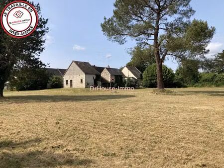 ensemble de 2 maisons avec dépendances sur grand terrain plat