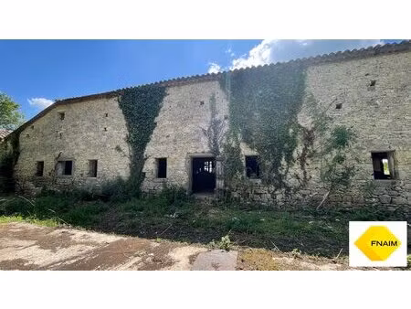 grange en pierre de 820 m² - terrain 3 710 m²