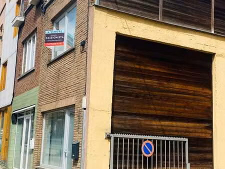 commerce avec 5 mètres de vitrine + logement & grand jardin.