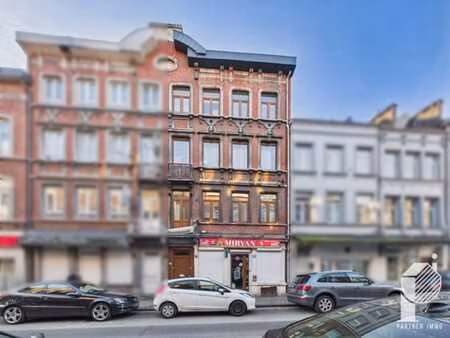 immeuble de rapport 3 logements et 1 commerce ok d'urbanisme