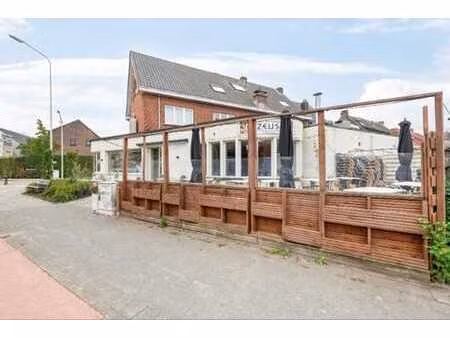 gunstig gelegen handelspand met garage en zonnig terras!