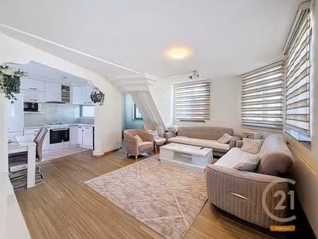 immeuble de rapport - duplex 2 chambres + rdc commercial