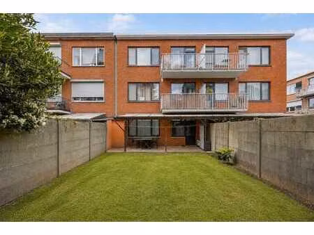 lichtrijk gelijkvloers appartement met ruime tuin in hartje…