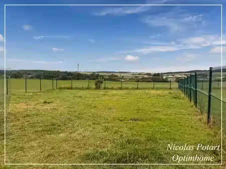 terrain plat et clôturé de 544 m² dans un quartier résidentiel