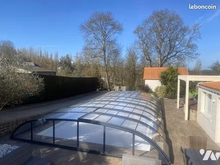 maison 9 pièces 225 m²