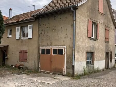 maison comprenant 2 appartement