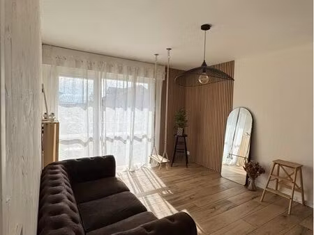 appartement rénové avec balcon – douvaine centre (proche genève)