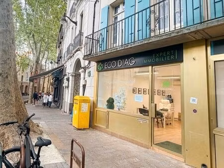 local commercial 25m2 climatisé avec toilettes - centre ville