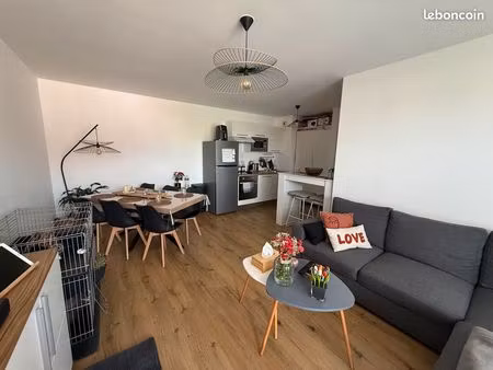 t3 2 chambres – garage fermé – ascenseur – balcon – cuisine équipée