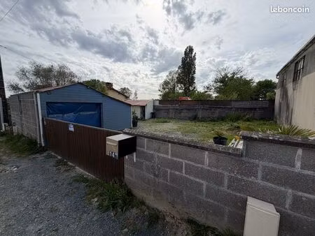 terrain 200 m² et garage de 30 m²