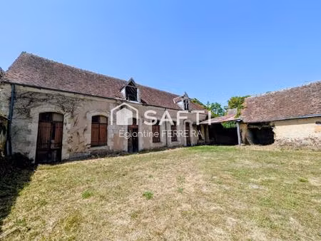 commune de gracay  ensemble en pierre avec jardin.