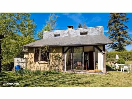 maison de campagne de 48 m² avec véranda  terrasse et grenier sur un terrain arboré de 2 9