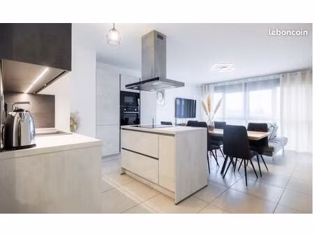 t3 de 70 m² avec terrasse  ascenseur et 2 places de parking