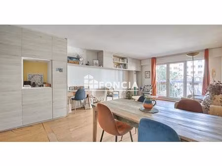didot: immeuble moderne 3 pieces de 73m2 avec cave et parking