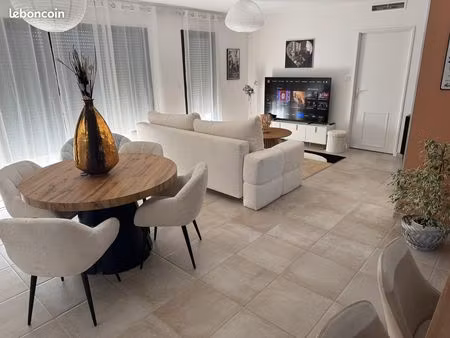 maison 100 m2 avec 3 chambres - garage  terrasse et jardin