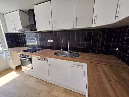maison de ville de 70 m² proche des écoles  commerces et transports