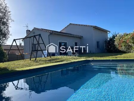 maison de 157 m2 en 6 pièces  avec garage et piscine