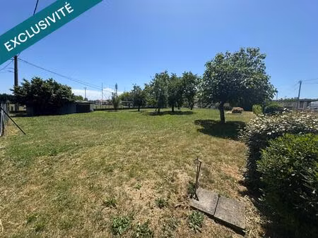 rare: terrain plat constructible en partie viabilisé