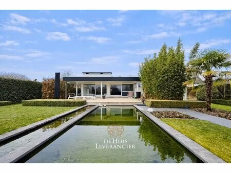 elegante laagbouwvilla waar discrete rust  moderne uitstraling en standing versmelten in h