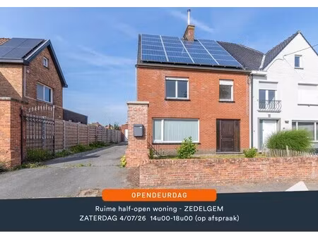 leuke & lichtrijke charmante half-open woning met 4 slaapkamers  garage en leuke tuin!