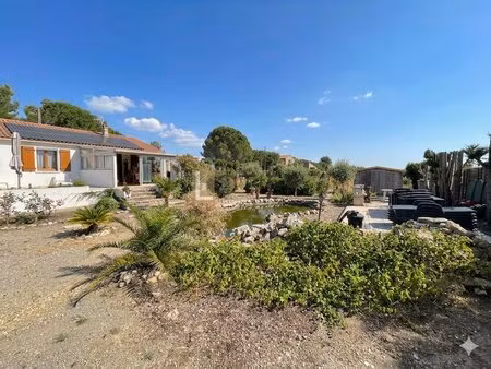 maison de 110m2 au total sur une parcelle de 2110m2