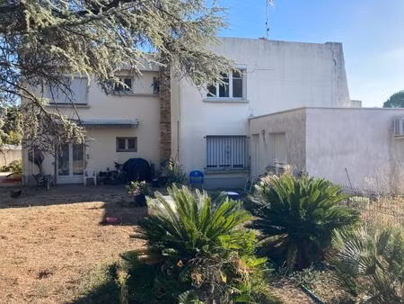 castelnau-le-lez  maison de 160m² en 2 appartements  sur terrain de 1.200m² constructible 