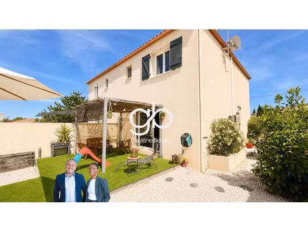 paulhan : maison contemporaine avec jardin  terrasse et gara