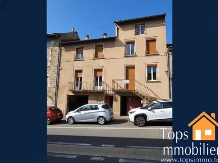 grand immeuble comportant 3 appartements et 2 garages au centre de villefranche de...