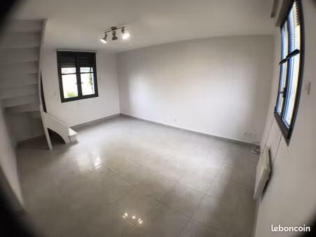 f3 en duplex avec garage et climatisation réversible proche centre-ville