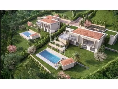 a vendre à mougins  terrain à diviser en 2 villas avec permis de construire purgé