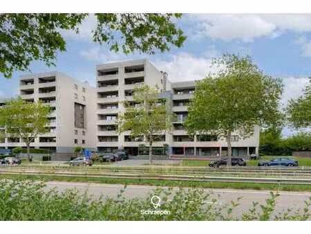 gelijkvloers appartement met 1 slpk én overdekt terras te...