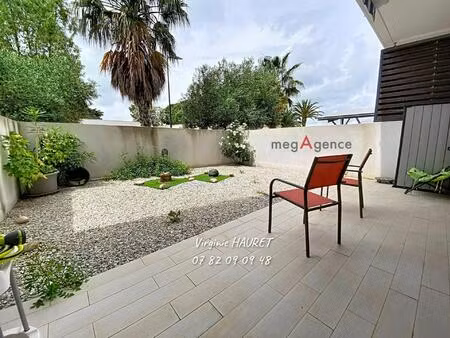 appartement en rez-de-chaussée - 1 chambre - 1 terrasse de 48m²