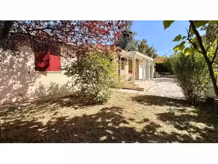 maison de plain-pied 108 m² • 3 ch • double véranda • jardin paysagé 