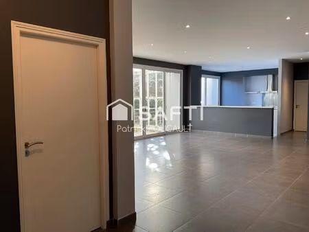 appartement  rez de jardin avec jardin d'hiver